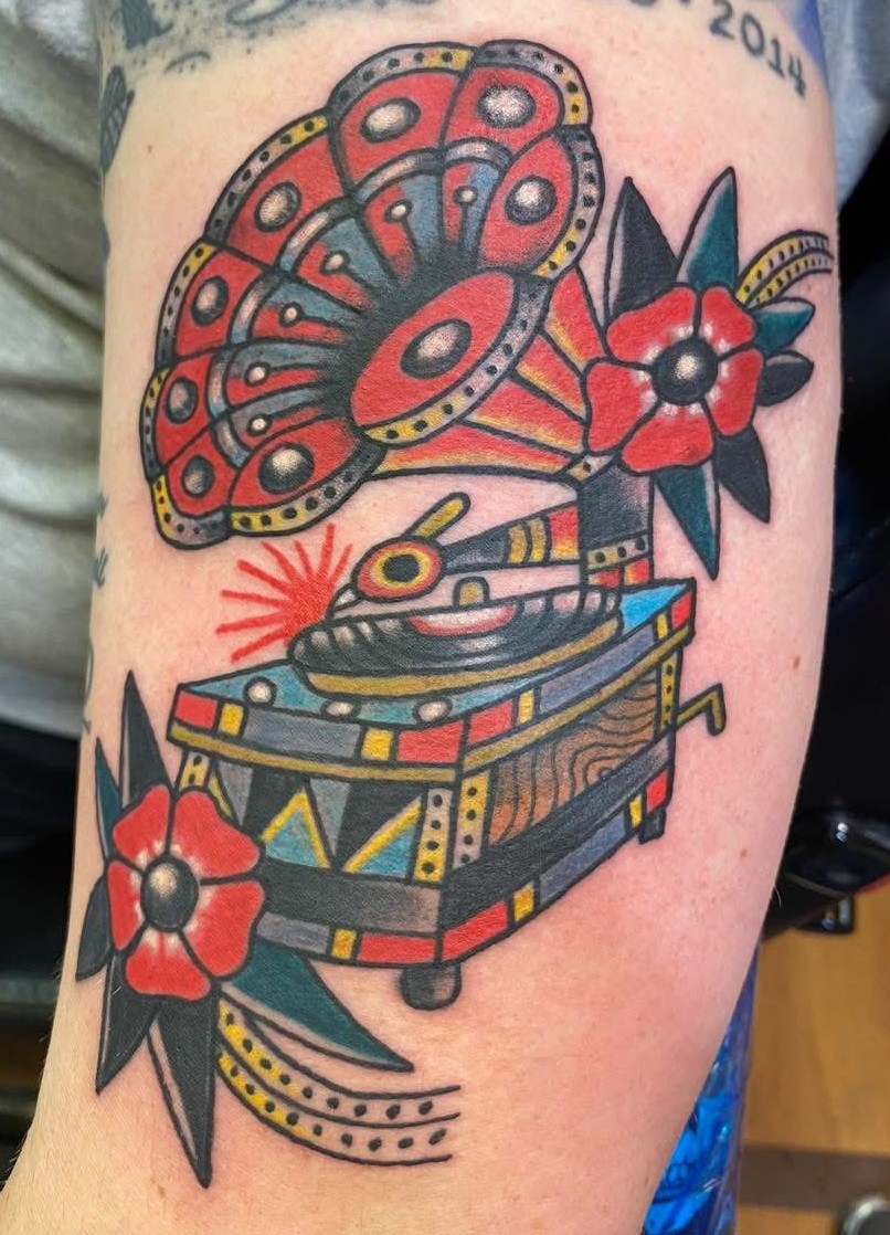 stylized phonograph done in classic red and green and yellow